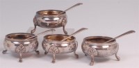 Lot 497 - A set of four mid Victorian silver table salts,...