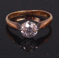 Lot 518 - A yellow gold diamond solitaire ring, the claw...