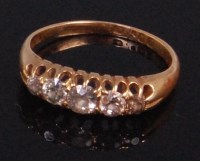 Lot 544 - A yellow gold five stone diamond dress ring,...