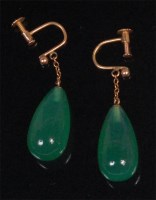 Lot 549 - A pair of polished spinach jade ear pendants,...