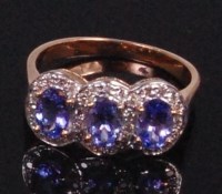 Lot 562 - A contemproary 9ct gold tanzanite and diamond...