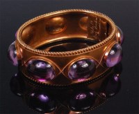 Lot 563 - A late Victorian gilded gold and amethyst set...