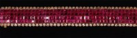 Lot 568 - A contemporary 18ct yellow gold ruby and...