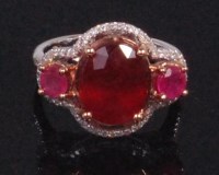 Lot 574 - A contemporary 14ct white and yellow gold ruby...