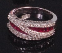 Lot 575 - A contemporary 18ct white gold ruby and...