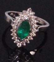 Lot 576 - A contemporary 14ct white gold emerald and...