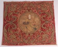 Lot 618 - An early embroidered red velvet panel from a...