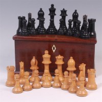 Lot 640 - A Jaques type ebony and boxwood chess set, the...