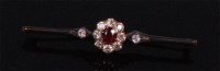 Lot 525 - An early 20th century gilt metal ruby and...