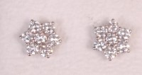 Lot 527 - A pair of contemporary white metal diamond set...