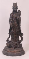 Lot 658 - A Chinese bronze statue of Quan Yin standing...