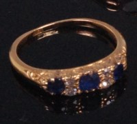 Lot 540 - An 18ct gold sapphire and diamond dress ring,...