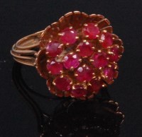 Lot 552 - A French yellow gold and ruby set dress ring,...