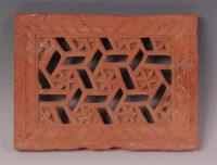 Lot 675 - An Indian red sandstone panel, carved and...