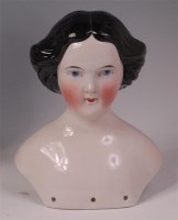 Lot 426 - A circa 1900 Continental porcelain dolls head,...