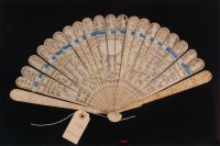 Lot 693 - A 19th century Chinese Canton carved ivory fan,...