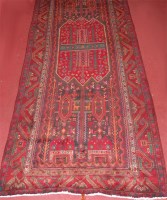 Lot 817 - A Persian woollen rug, the blue ground...