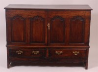 Lot 844 - An antique joined oak mule chest, having twin...