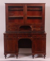 Lot 872 - An early 19th century mahogany kneehole...