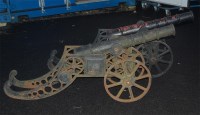 Lot 876 - A pair of cast iron ornamental cannons, black...