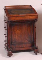 Lot 888 - A mid Victorian figured walnut kneehole...