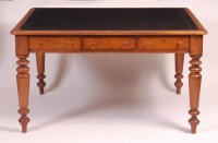 Lot 904 - A Victorian oak library table, having a gilt...