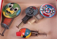Lot 3156 - 4 early to mid 20th century spinner toys, a...