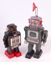 Lot 3172 - Japanese tinplate battery operated robot group...