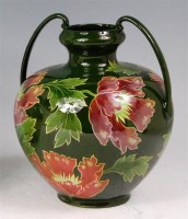 Lot 16 - An Austrian Art Nouveau glazed ceramic twin...