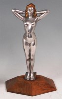 Lot 47 - An Art Deco style aluminium figure of a female...