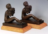 Lot 84 - A pair of Art Deco style bronze book-ends,...