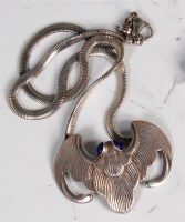 Lot 135 - A Jocelyn Burton silver bat pendant, having...