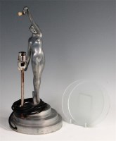 Lot 141 - An Art Deco cast aluminium table lamp, in the...