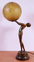 Lot 142 - An Art Deco gilt patinated spelter table lamp,...