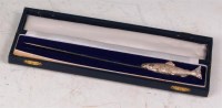 Lot 104 - A 1980s silver paperknife, the handle in the...