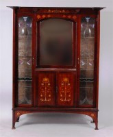 Lot 383 - An Art Nouveau Glasgow School style walnut and...