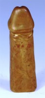Lot 74 - A solid gilt brass penis shaped salt shaker,...