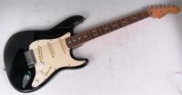 Lot 14 - A Mexican Fender Stratocastor electric guitar,...