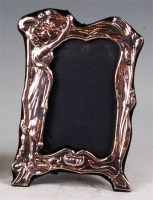 Lot 28 - An Art Nouveau style embossed silver...