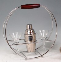 Lot 151 - A contemporary chromed metal Martini stand,...