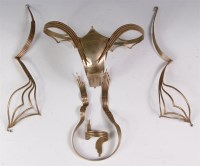 Lot 69 - A four piece set of erotica gilt metal body...