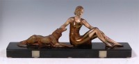 Lot 189 - An Art Deco patinated spelter figure group,...