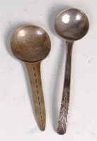Lot 170 - Two Arts & Crafts style silver spoons, each...
