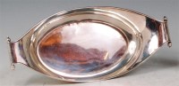 Lot 157 - An Art Deco silver oval twin handled tray,...