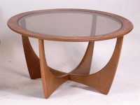 Lot 375 - A 1960s G-Plan teak circular occasional table,...