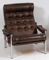 Lot 384 - A Danish 1960s chrome and chocolate brown...