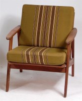 Lot 385 - A Danish 1960s teak open armchair, having...