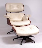 Lot 394 - After Charles & Ray Eames No.670 & 671 swivel...