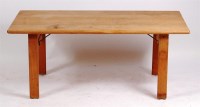 Lot 354 - A 1960s Danish light oak coffee table, of...