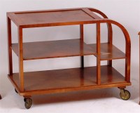 Lot 350 - An Art Deco walnut three tier tea trolley,...